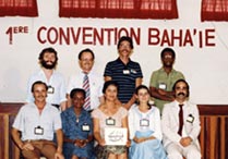 Photograph of members of the first Spiritual Assembly of the Bahá’ís of French Guiana taken during its first Bahá’í Convention in 1984.
